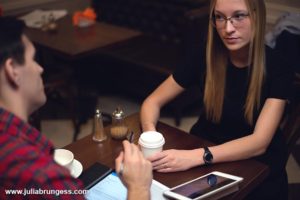 Couple Collaborating About Divorce Over Coffee